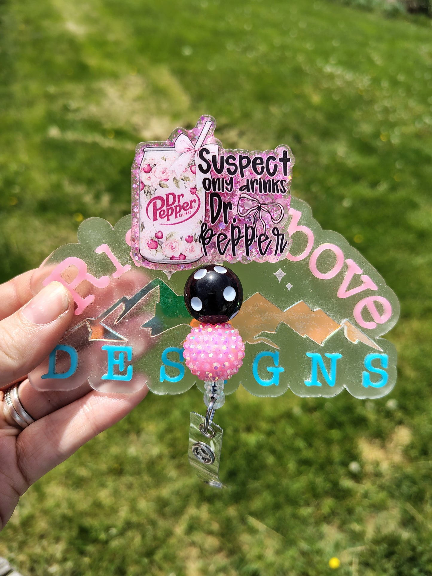 Suspect Only Drinks Dr. Pepper Beaded Badge Reel